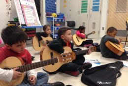 Children Playing the Guitar