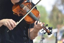 Boy Playing Violin in Band